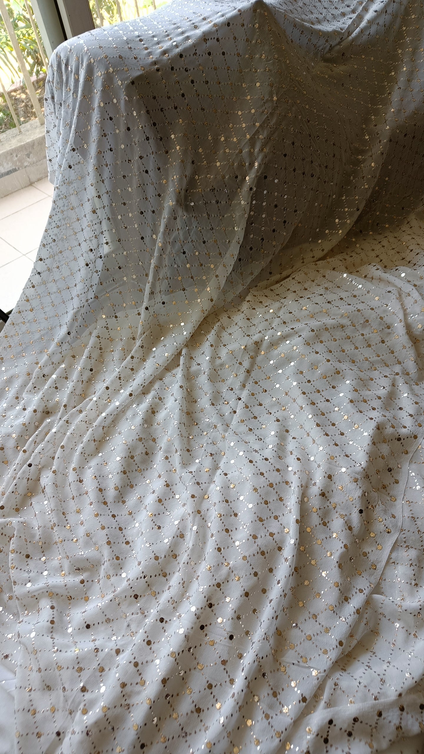 Ruhani Ivory pure georgette allover heavy mukaish running material